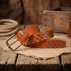 Rustic lifestyle image of Berbanto tan studded leather belt.