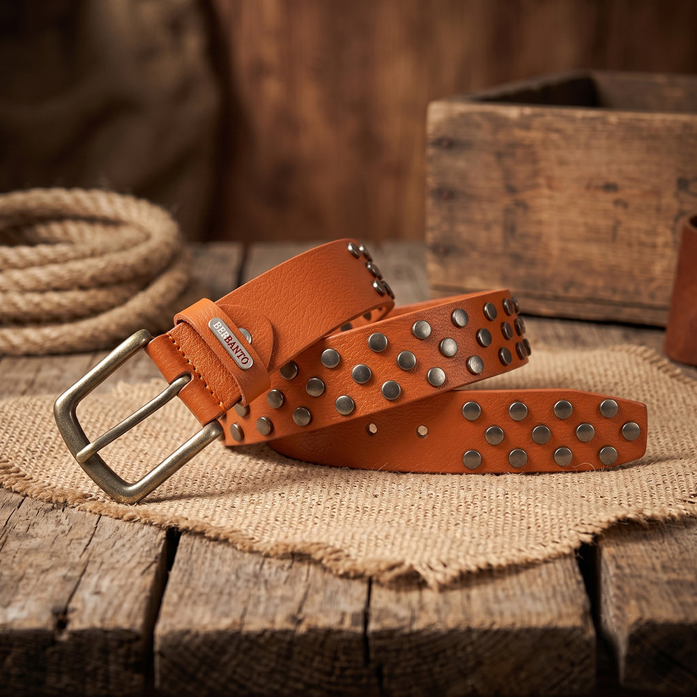 Rustic lifestyle image of Berbanto tan studded leather belt.